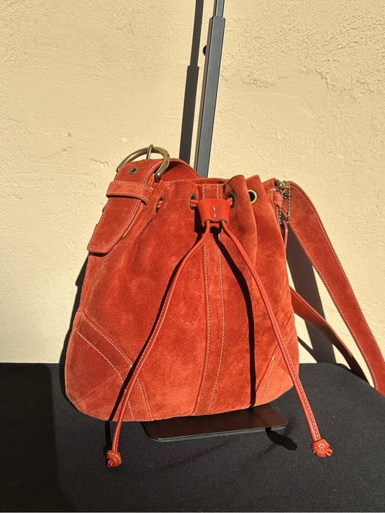 Coach Handbags - Coach Rust Orange Suede Drawstring Crossbody Bag